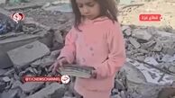 تلاش کودکان فلسطینی برای جمع‌آوری بقایای قرآن در مسجد تخریب شده